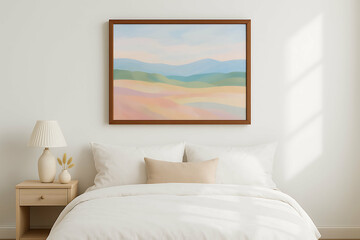 Minimalist bedroom with white bedding, a wooden nightstand, a lamp, and a pastel landscape painting above the bed.