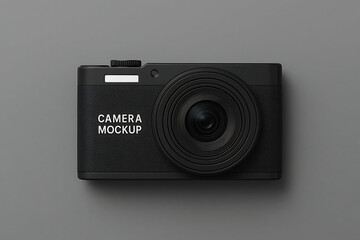 A sleek black compact camera with a large lens is displayed on a gray background, labeled as a "Camera Mockup.