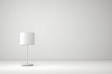 White table lamp in a minimalist setting.