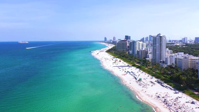 Miami Beach Florida 4K Aerial Drone Footage Over The Oceanfront. Collins Ave to South Beach on a Bright Sunny Day with Blue Skies Flying Sideways (Angle 2)