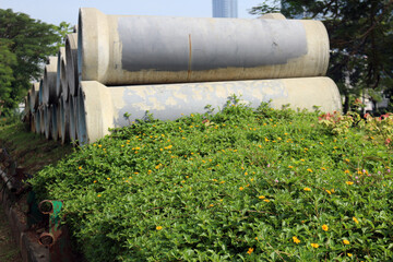 Large concrete pipes on the streets of Jakarta city