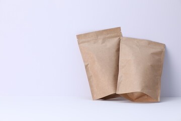 Zipper stand-up pouches on white background. Mockup for design