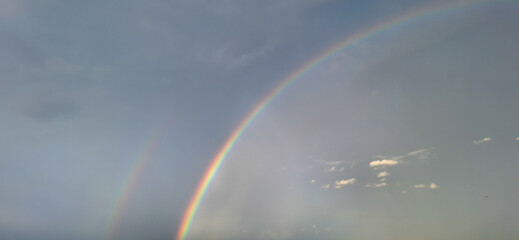 Natural Rainbow in the Sky After Rain – Soft Light and Cloudscape