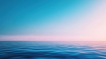 Obraz premium Calm ocean water with a gradient sky at sunset near the horizon
