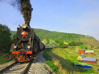 Circum-Baikal Railway, a historic line skirting the stunning Lake Baikal in Russia, offers breathtaking views. Once part of the Trans-Siberian Railway, it now primarily serves as a tourist attraction,