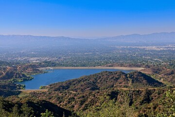 The Hollywood Hills fade into the San Fernando Valley with the San Gabriel Mountains and Santa...