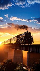 Silhouette of a Steam Train Crossing a Bridge against a Vibrant Sunset Sky with Warm Golden Hues