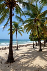 the image captures a serene view of a sandy beach lined with tall palms. clear turquoise water gently meets the shore, where a few individuals are visible enjoying the water