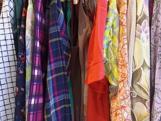 Colorful Fashion Apparel Hanging on Rack