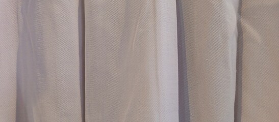 Elegant Soft White Fabric with Gentle Folds Texture