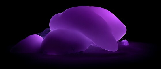 Abstract purple shapes against a black background.