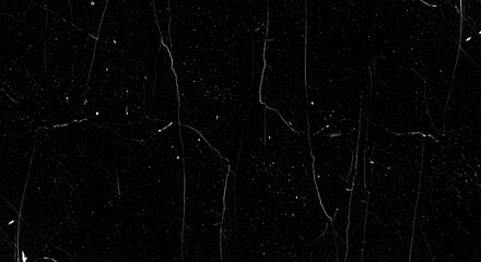 Distressed Black Surface with Fine White Scratches and Speckled Texture.