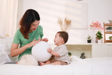 Mothers who play with their children strengthen the loving relationship between mother and child.
