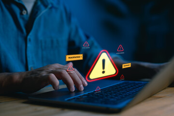 Cybersecurity warning concept with alert signs appearing on a laptop screen, representing system...
