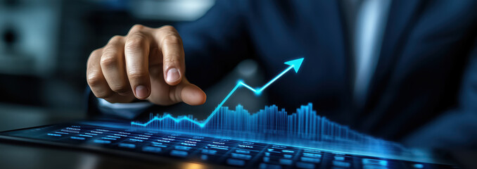 Photography advertising shot of close up businessman touching an upward arrow on a virtual graph with empty background.