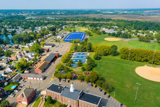 Landscape of Sayreville, Middlesex County, featuring blue football stadium, multiple sports fields, parking areas, residential neighborhoods, residential zones.