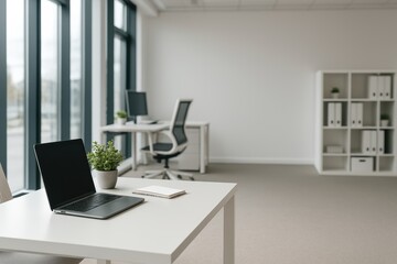 Fototapeta premium Modern and Minimalist Office Workspace with Laptop, Desk, Chair, and Shelving Unit in Bright and Spacious Environment