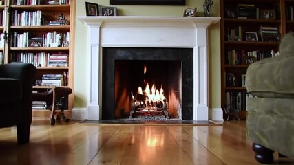 Cozy fireplace burning wood in a warm home interior during winter - Powered by Adobe