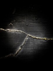 Fototapeta premium Abstract scratch grunge concrete wall texture. Use as a background or wallpaper. Black and white, so contrast and grainy