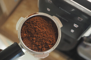 Freshly ground coffee ready for brewing espresso