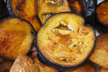 Deliciously roasted eggplant slices on a platter