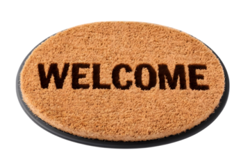 A brown oval doormat with "WELCOME" text, isolated on white.