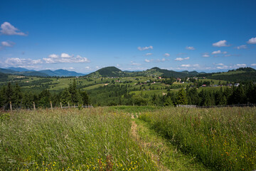 Landscape from Piatra Fântânele, is a village in the commune of Tiha Bârgăului, Bistrița-Năsăud County, Transylvania, Romania. It is located in the Tihuța Pass, 2025