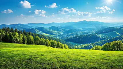 Naklejka premium Vibrant green hills under a bright blue sky with scattered clouds and distant mountains.