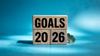 Wooden blocks stacked to display the word goals above the numbers 2026 symbolizing future aspirations and objectives