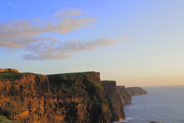 Spectacular Bright Sunny Evening View of the Majestic Cliffs of Moher, County Clare, Ireland –...