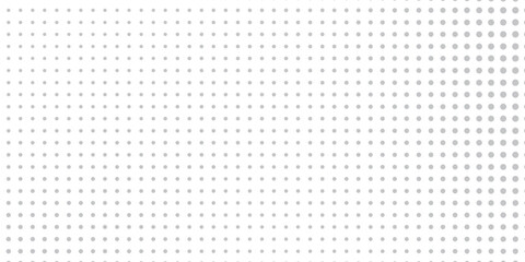 Modern silver halftone gradient texture. Vanishing polka dot background. Repeating dots gradation pattern background abstract simple art