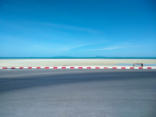 Asphalt Road Along Nathon Beach with Blue Sky and Cloud Background, Koh Samui, Thailand