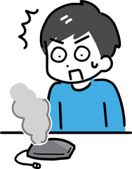 モバイルバッテリーの煙に驚く男性
