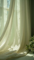 Sheer striped curtains with sunlight and white flowers indoors