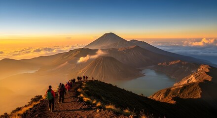 Hikers ascend a volcanic mountain ridge at sunrise, with dramatic volcanic landscape in the background.
