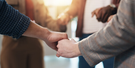 People, prayer group and holding hands with faith for religion, worship or god in home. Christian, community or trust with support, unity or solidarity for praying, spiritual connection or social