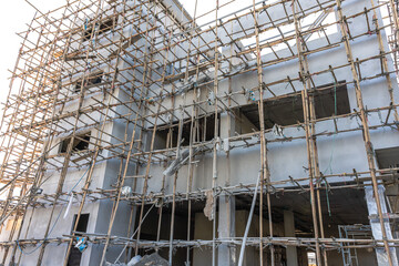 Bamboo scaffoldings at under construction building for high risk workers in site
