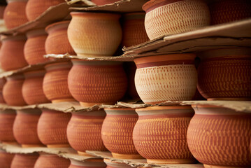 Ceramic pottery pots stacked for sale in Raquira, Boyaca, Colombia, a tourist town known for its...