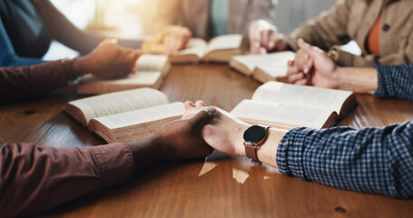 People, prayer group and holding hands with bible for religion study, faith or word of God in home....