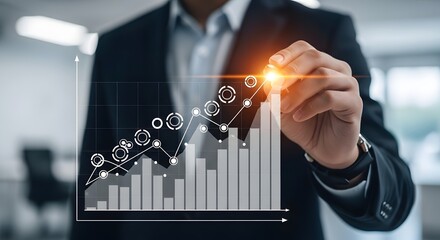 A businessperson's hand draws an upward-trending graph, symbolizing growth and success.
