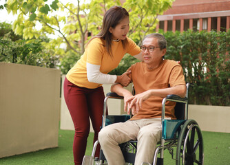Help support retirement health care. A man is being cared for privately at home by an Asian woman...
