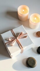 Gift card, zen stones, candles, flatlay, white background, zen, recharge, mindfulness