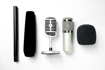 Set of Studio and vintage silver microphones for podcasting or streaming with a white background. Top view