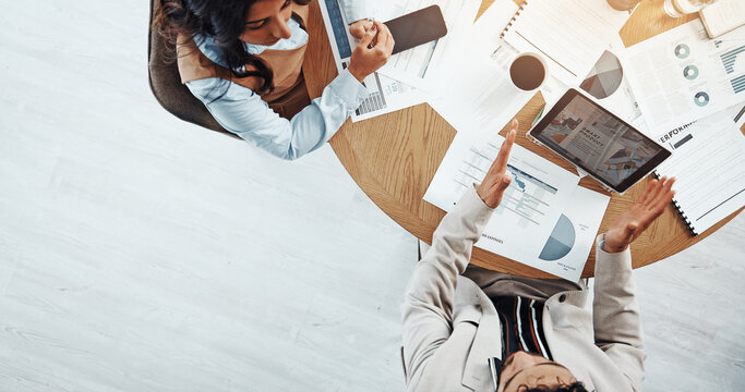 Meeting, documents and business people in office with tablet for investment statistics. Paperwork, space and technology in workplace for financial advisors, finance graphs and data charts from above - Powered by Adobe