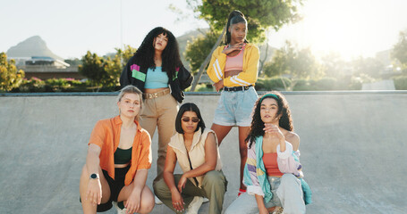 Attitude, fashion and portrait of women outdoor at park together in retro streetwear as dance crew. Community, diversity and urban style with serious group of dancer friends in city for bonding
