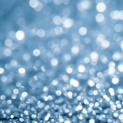 Abstract Blue Bokeh Lights Background with Shimmering Sparkle Effect