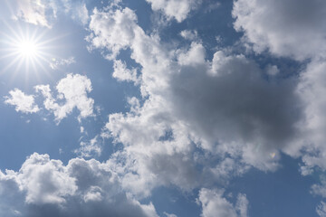 Blue sky and white clouds background.