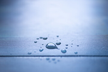 Water Drops On Blue Wooden Plank