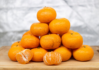 Group of Ripe Orange or Citrus or tangerina and peeled fruit With clipping path. Full depth of field,,