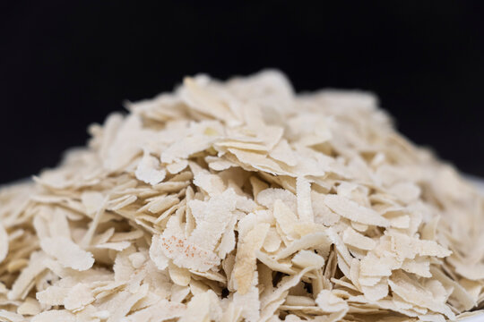 Poha or Flattened rice or Beaten rice on balck background...